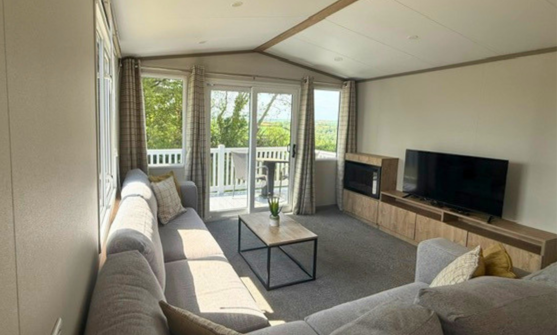 Internal of a caravan lounge with decking