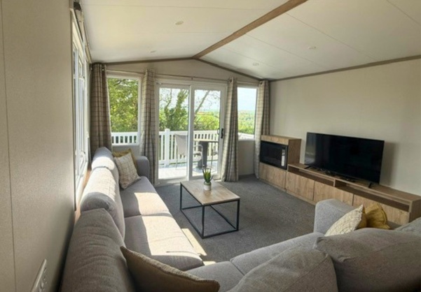 Internal of a caravan lounge with decking