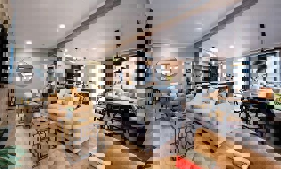 Lounge, dining area and kitchen view from lounge area in modern scandi-industrial style