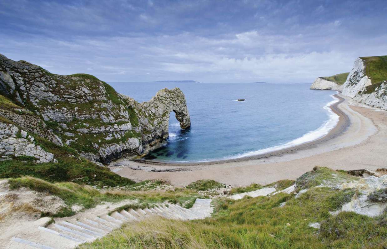 The famous natural limestone arch along the Jurassic Coast of Durdle Door Beach
