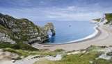 The famous natural limestone arch along the Jurassic Coast of Durdle Door Beach