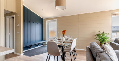 Internal of a luxury lodge dining area beside entranceway