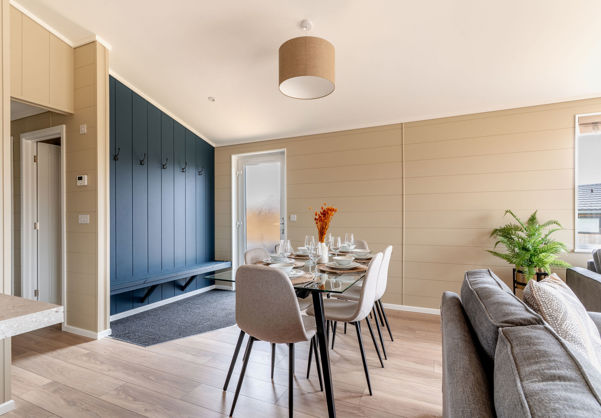Internal of a luxury lodge dining area beside entranceway