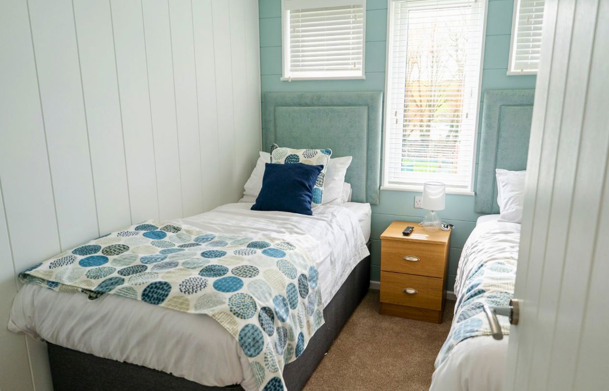 Internal of a luxury lodge twin bedroom