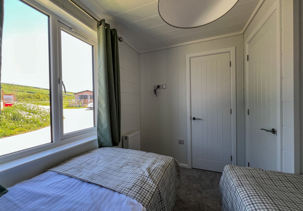 Internal of a luxury lodge twin bedroom