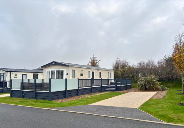 External of a caravan on pitch with decking
