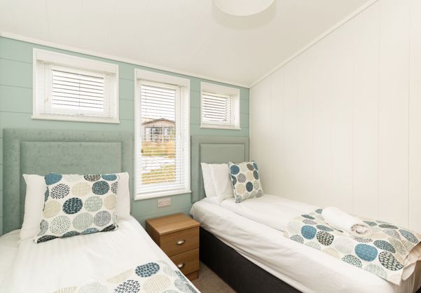 Internal of a luxury lodge twin bedroom