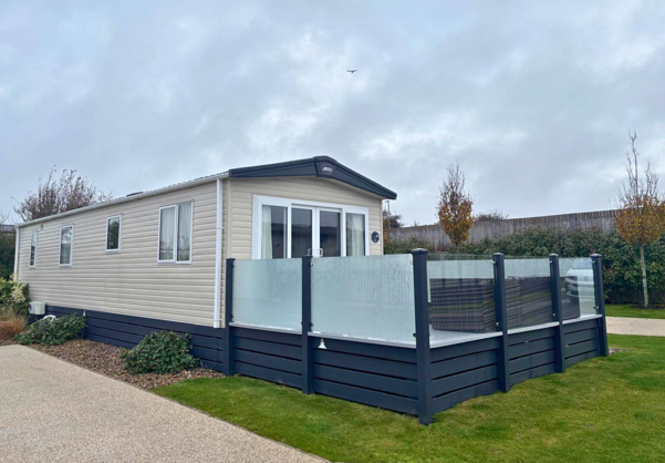 External of a caravan on pitch with decking