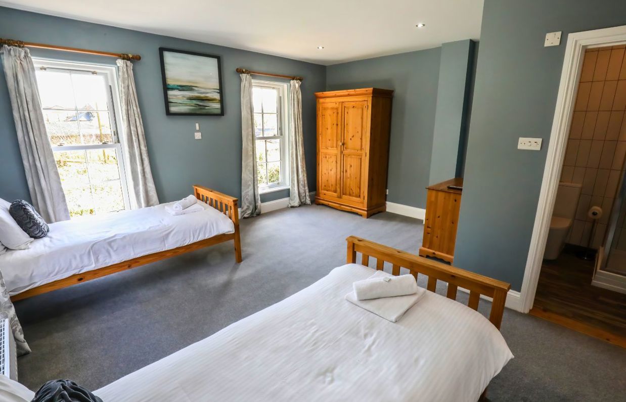 Internal of a manor house twin bedroom with ensuite