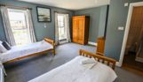 Internal of a manor house twin bedroom with ensuite