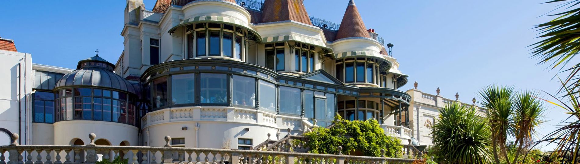 Exterior of a grand villa house Russell Cotes Museum and Art Gallery and surrounding gardens