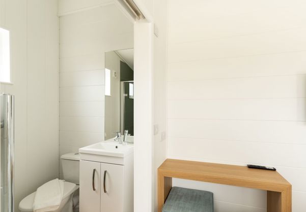 Internal of a luxury lodge ensuite bathroom with toilet and sink