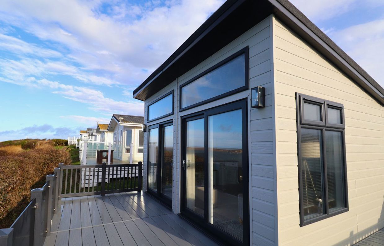 External of a caravan on pitch with decking