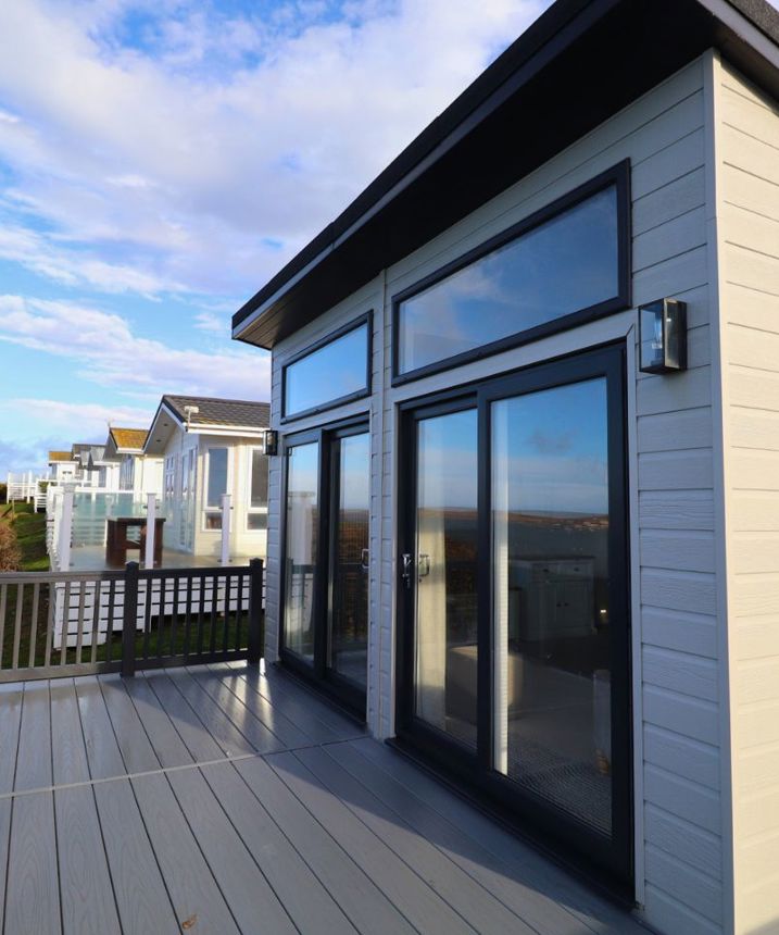 External of a caravan on pitch with decking