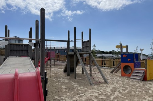 An outdoor play area beside Stargazy Bar & Grill