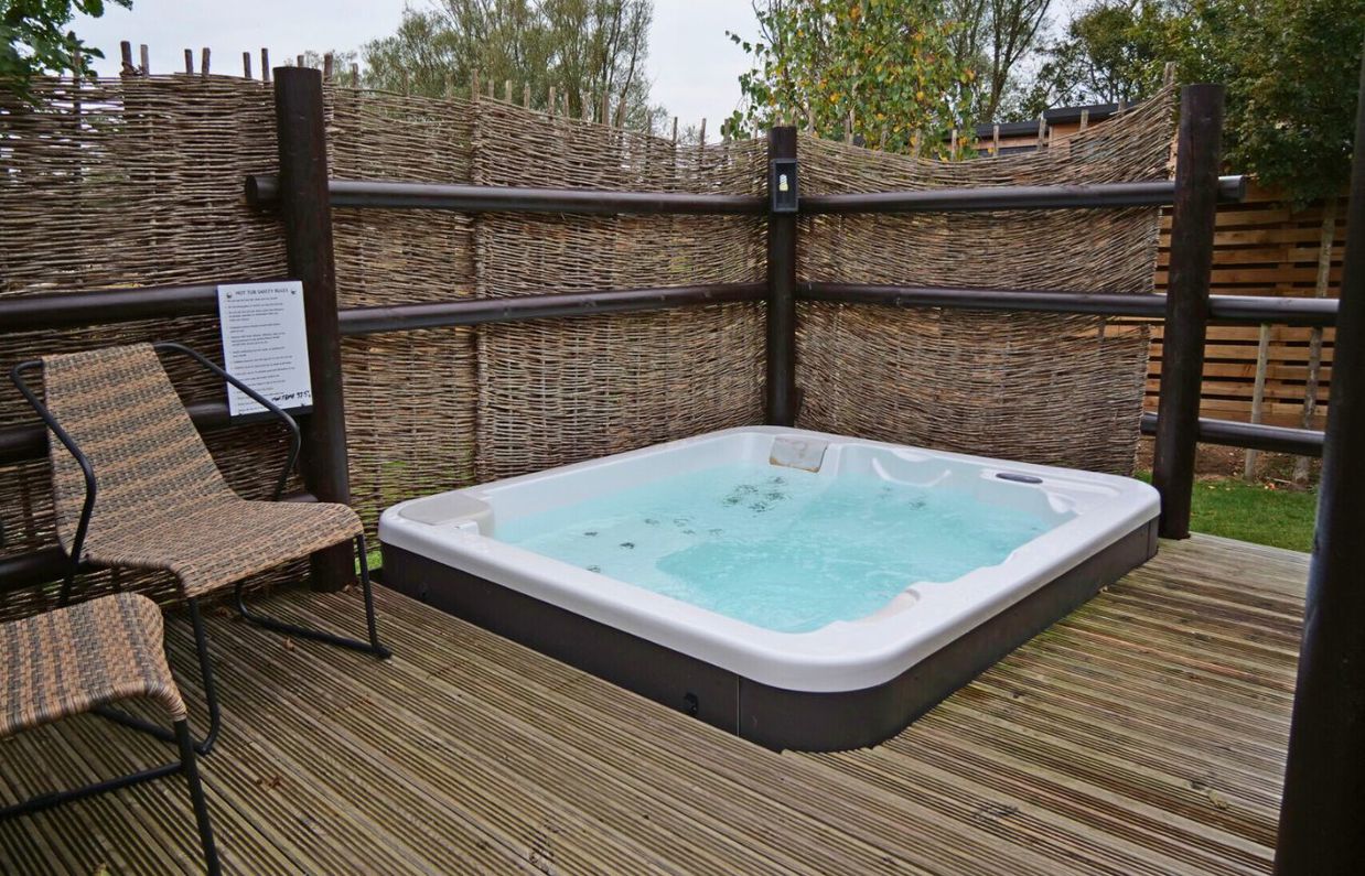 External of safari tent with hot tub