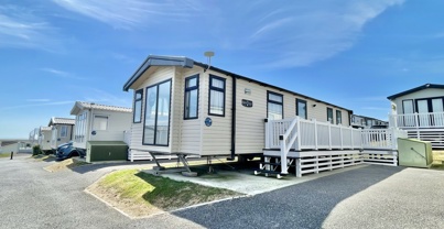 External of a caravan on pitch with decking