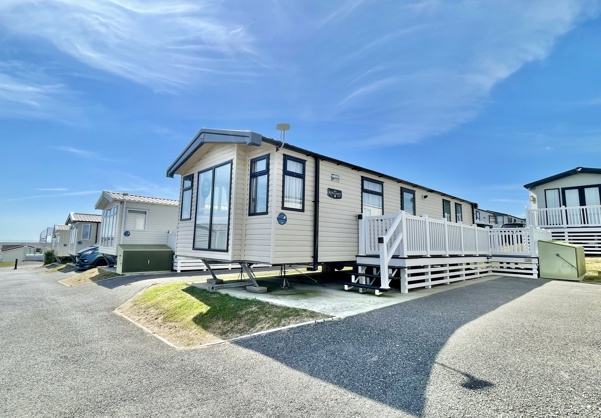 External of a caravan on pitch with decking