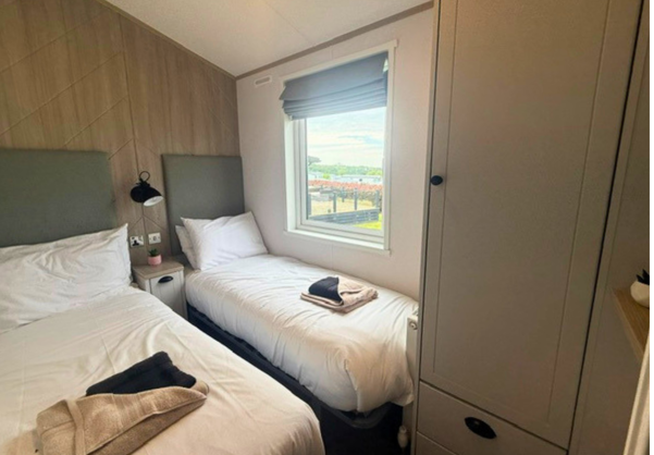 Internal of a caravan twin bedroom