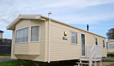 External of a caravan on pitch with steps