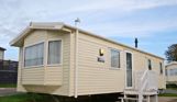 External of a caravan on pitch with steps