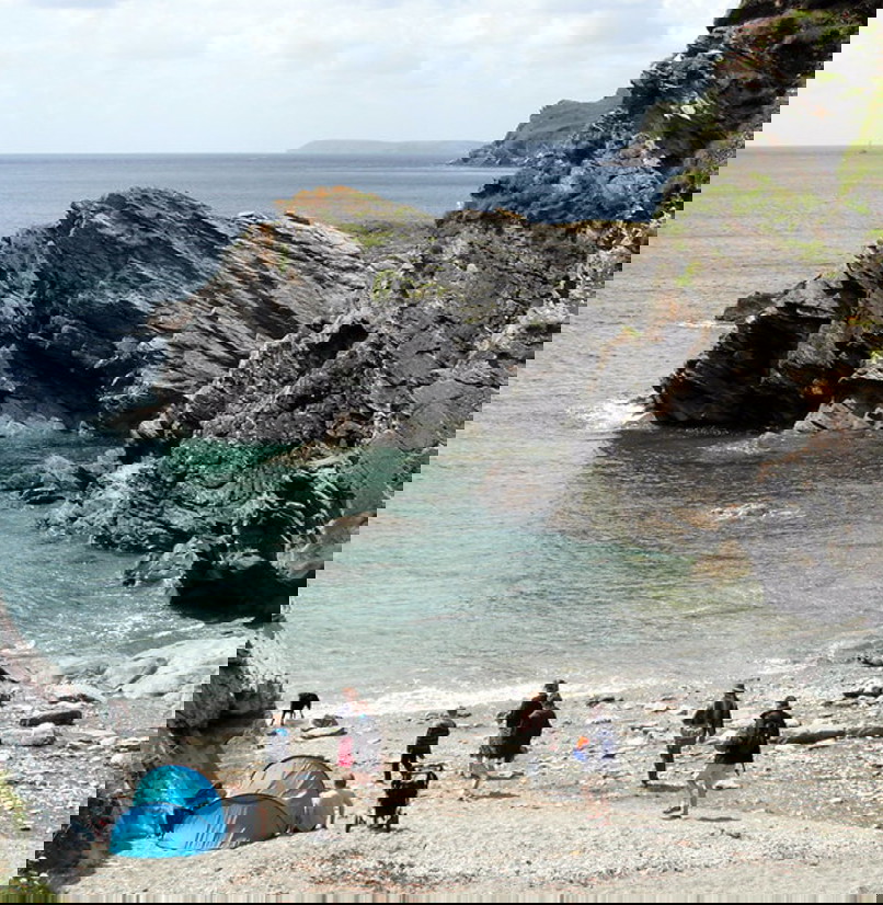 A small dog friendly cove with rocky headland