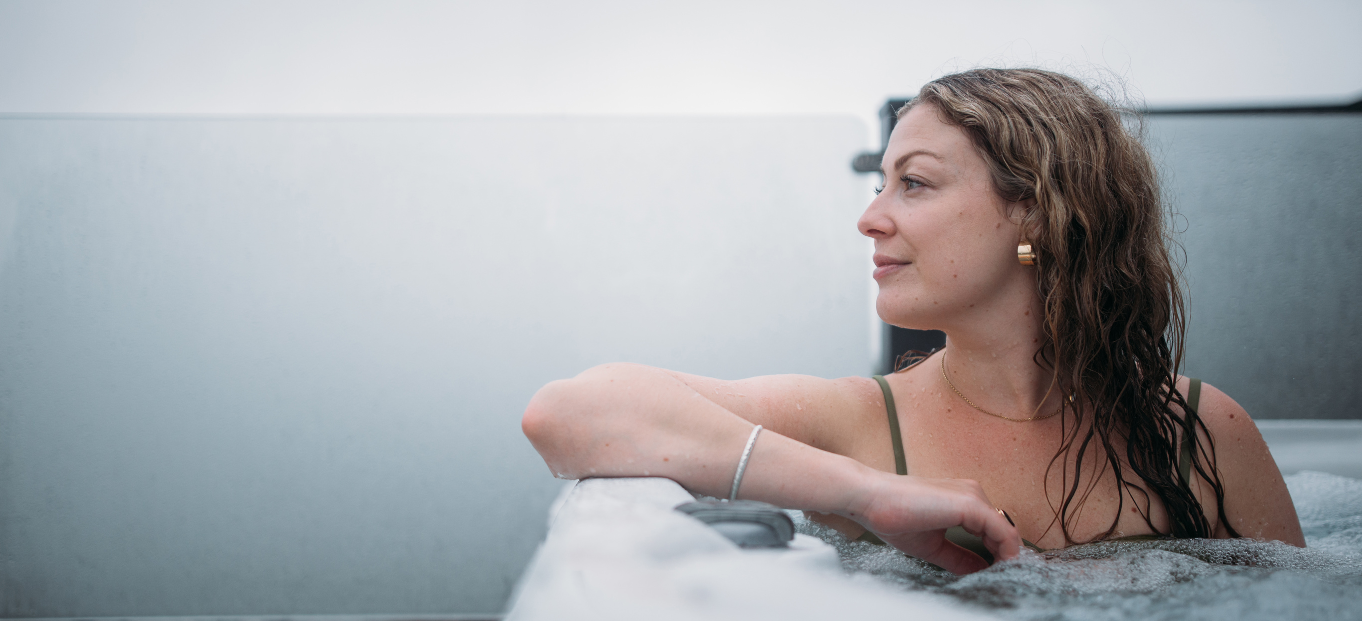 Woman relaxing in hot tub