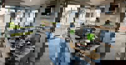 Open plan dining area overlooking the lounge and large windows