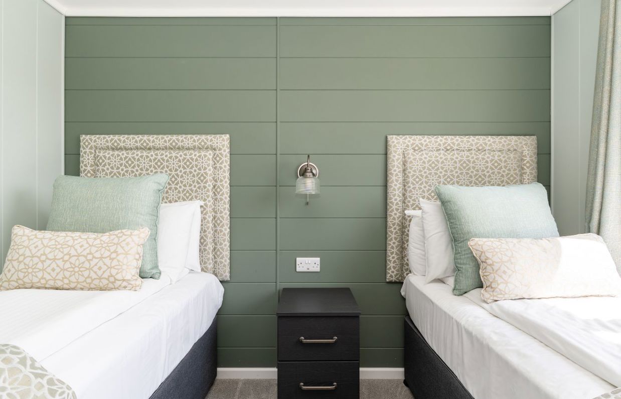 Internal of a luxury lodge twin bedroom