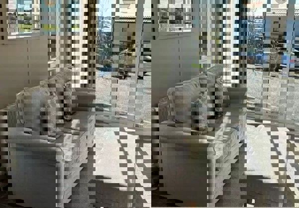 Sofa in lounge looking out of bi-fold doors