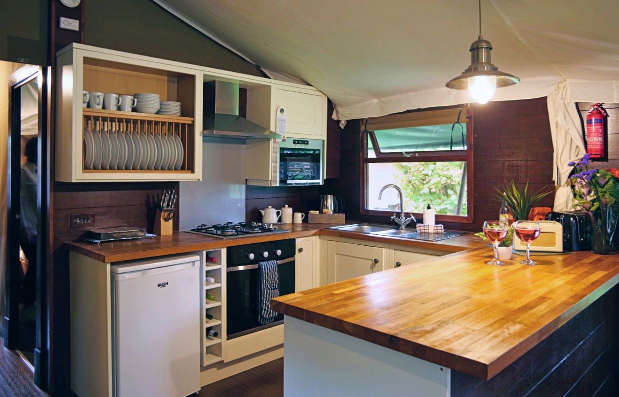 Internal of safari tent open plan kitchen