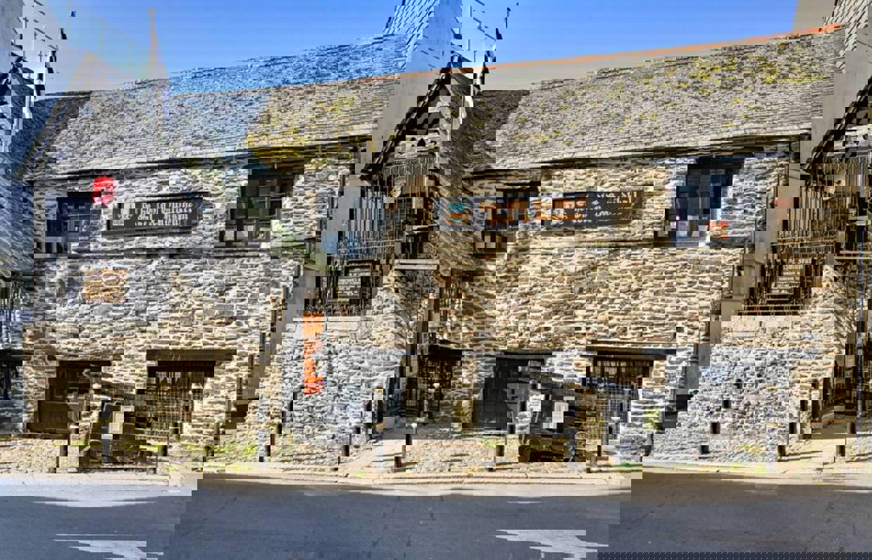 A stoney external building of the Old Guildhall Gaol & Museum