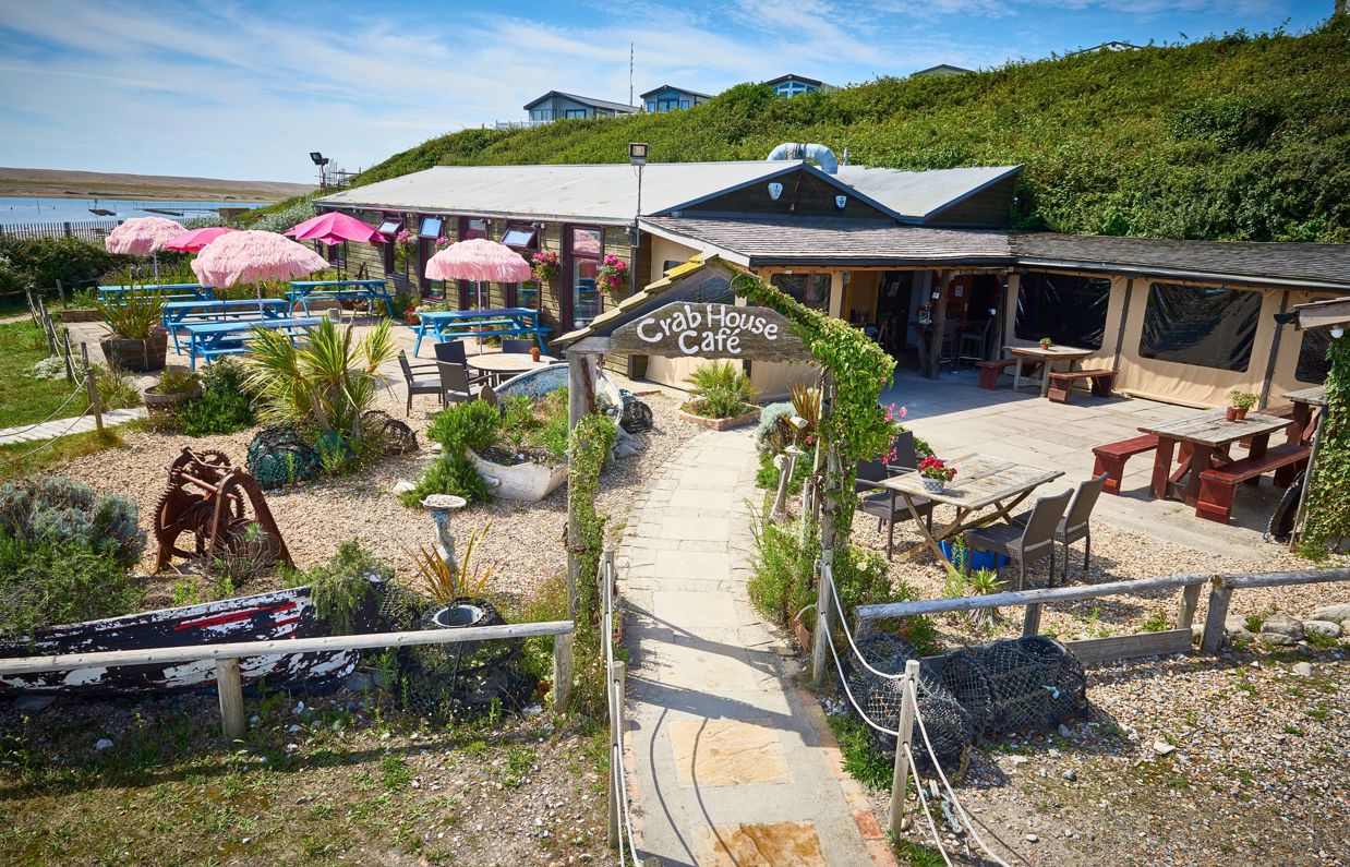 A restaurant by the coast called Crab House Café which specialises in seafood