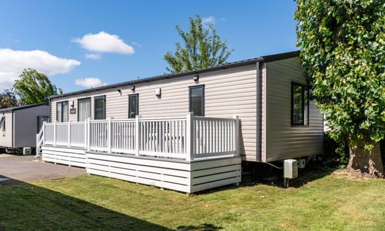External of a caravan on pitch with decking