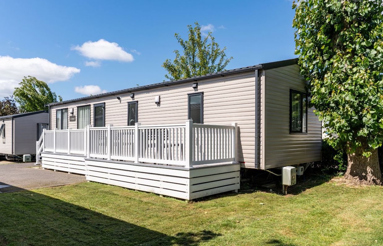 External of a caravan on pitch with decking