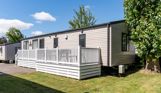 External of a caravan on pitch with decking