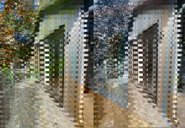 Lodge Decking Surrounded by Trees