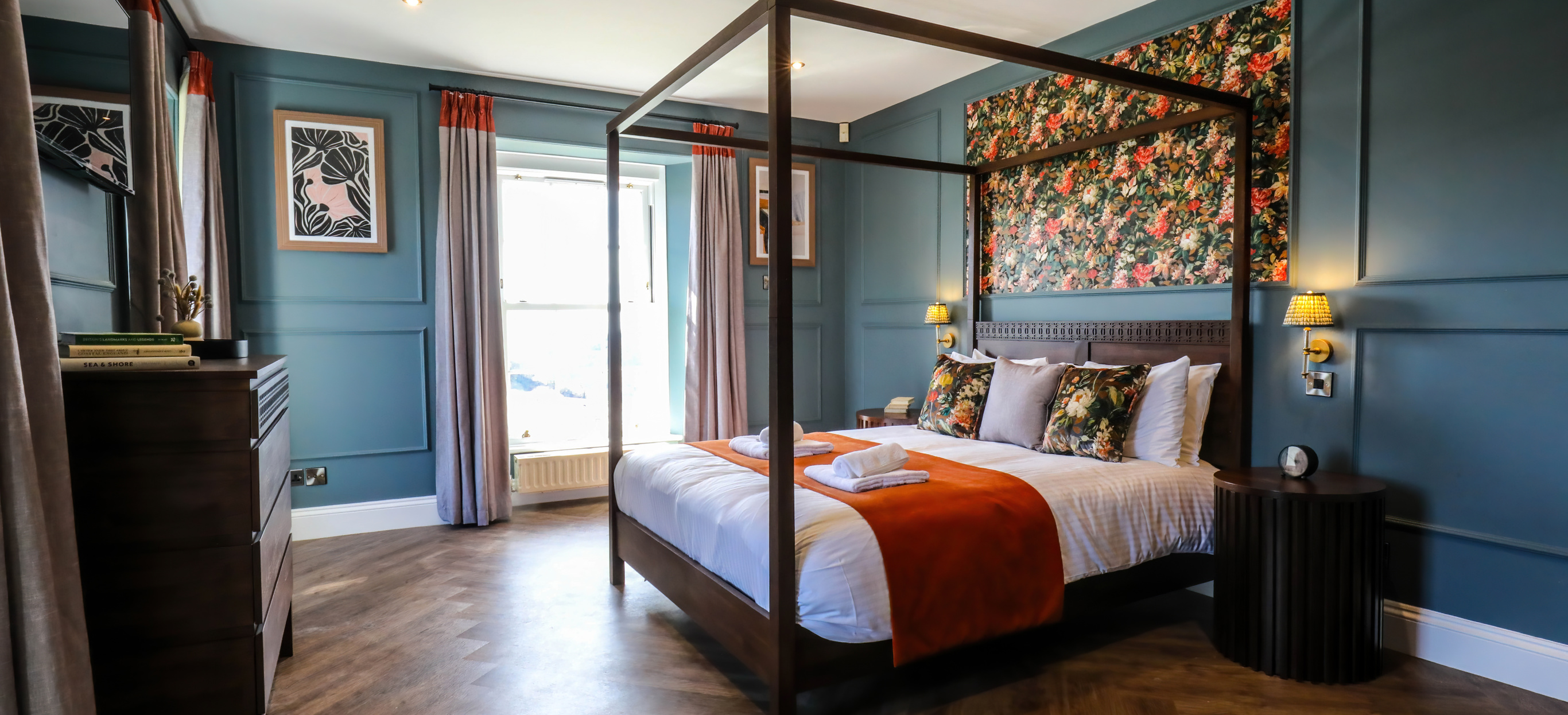 Internal of a manor house master bedroom with four poster bed 