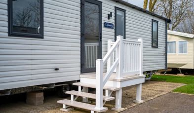 External of a caravan on pitch with steps