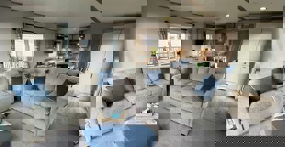 Spacious living area with two comfy sofas