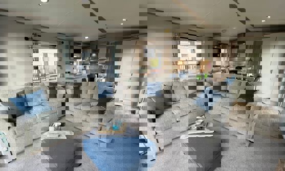 Spacious living area with two comfy sofas