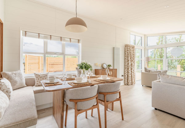 Internal of a luxury lodge dining area with bench seating