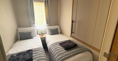 Internal of a caravan twin bedroom