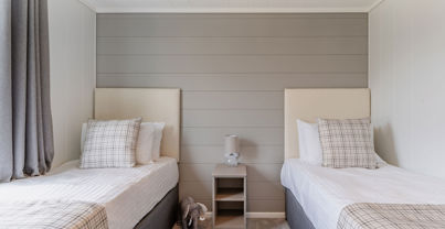 Internal of a luxury lodge twin bedroom