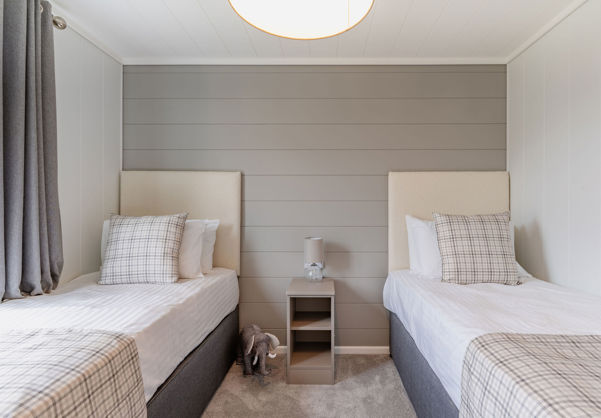 Internal of a luxury lodge twin bedroom