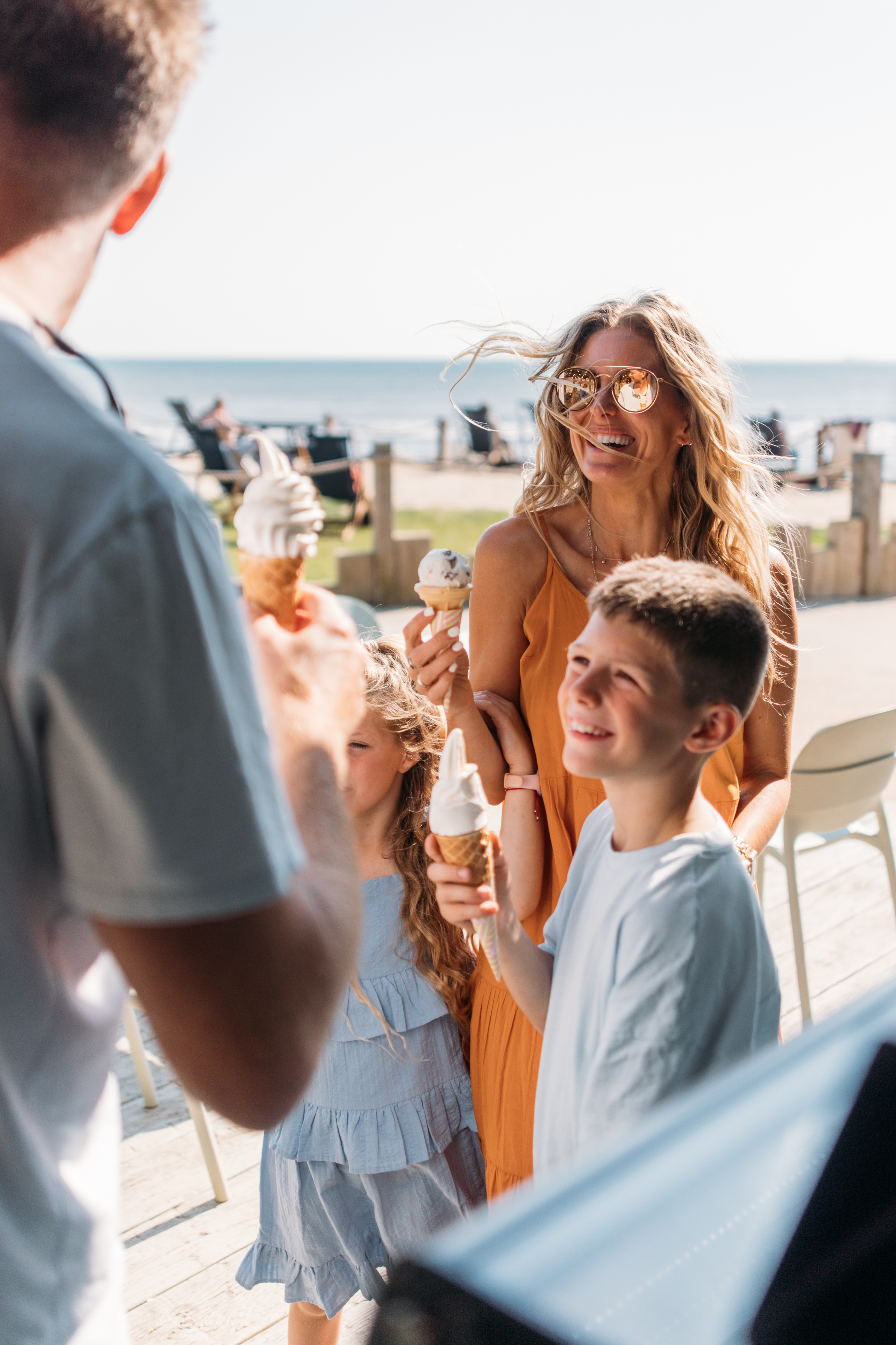 Family get ice creams on holiday