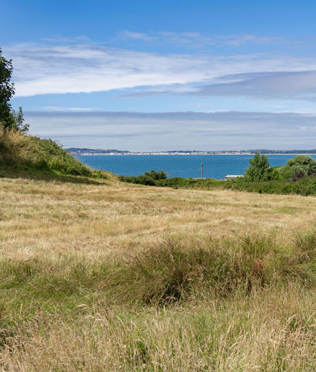 View of sea from countryside around Osmington Mills Lodge Park