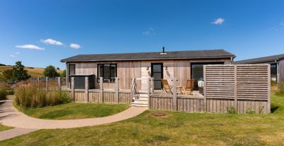 External of a cabin with decking 