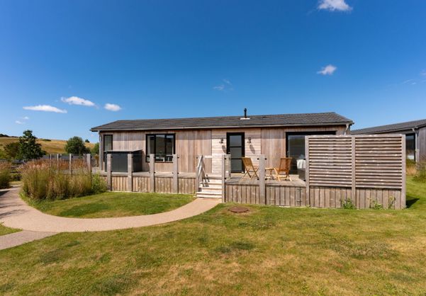External of a cabin with decking 