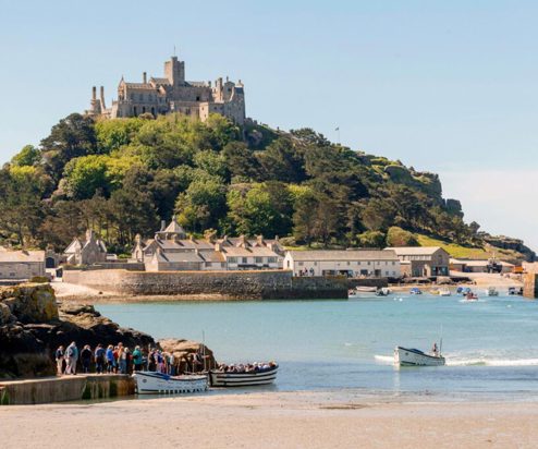 A striking castle atop a hill by the coast